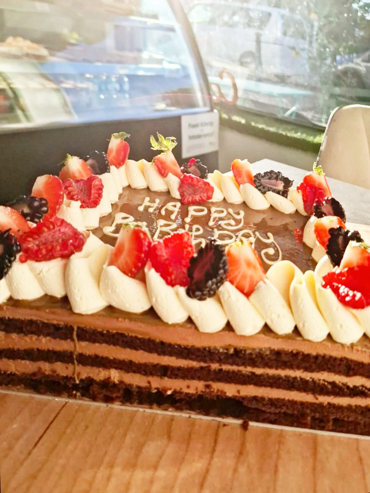 Bespoke birthday celebration cake with fresh berries from Crookies Bakery Countesthorpe